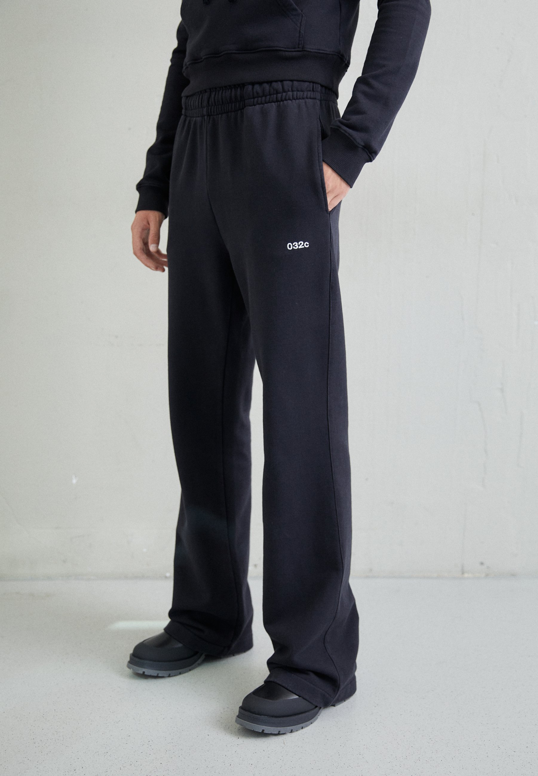 032c TOPLAYER WIDE FLARE PANTS UNISEX - Tracksuit bottoms - washed 