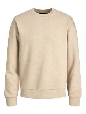 Beige sweatshirt gemaakt van zachte stof, met een ronde hals, lange mouwen en ribbelboorden en -zoom voor een ontspannen pasvorm.