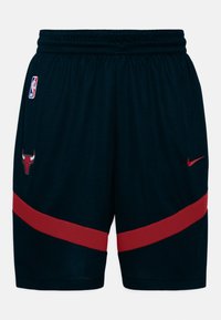 Sorte basketballshorts med en rød stribe, der har et Chicago Bulls-logo og en Nike-swoosh. Fremstillet af mesh-stof med en elastisk talje.