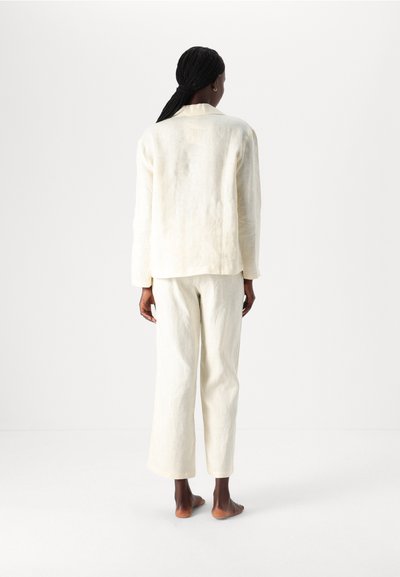 Sleeper CRUSOE  - Pyjama - white asparagus