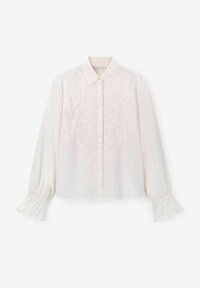 White long-sleeve blouse with a collared neckline, featuring floral embroidery down the front and ruffled cuffs. Soft, textured fabric.