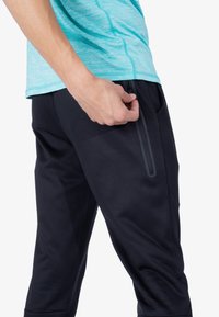 Spyder Pantalones deportivos - black