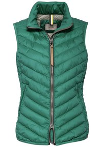 Veste matelassée verte sans manches avec col montant, texture matelassée diagonale, fermeture éclair à l'avant et accent beige au niveau du col. Matière synthétique légère.