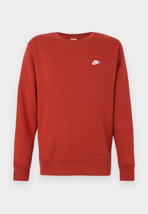 Rotes Baumwoll-Sweatshirt mit langen Ärmeln und gerippten Bündchen. Verfügt über ein kleines weißes Nike-Logo auf der oberen linken Brust. Klassisches Rundhalsausschnitt-Design.