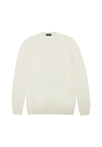 Cream-colored knit sweater with a crew neckline, long sleeves, and ribbed cuffs and hem. Smooth texture, no patterns or notable hardware.