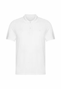 Valkoinen lyhythihainen polo-paita, joka on valmistettu puuvillasta. Klassinen kaulus, kahden napin lista ja hillitty logo vasemmassa rinnassa.