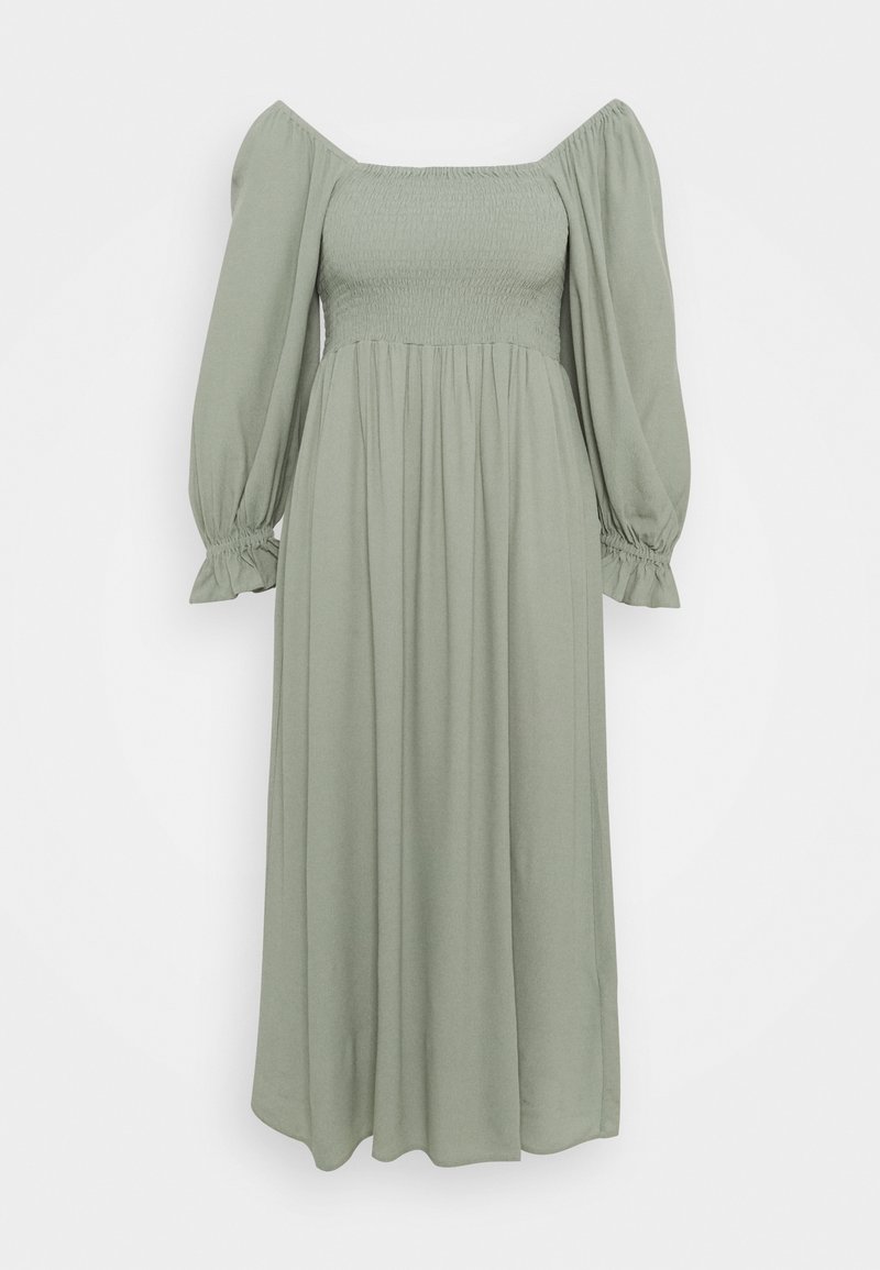 Robe à épaules dénudées smockée en tissu vert clair doux. Comprend des manches longues bouffantes et une jupe fluide. Texture lisse, longueur jusqu'aux chevilles.