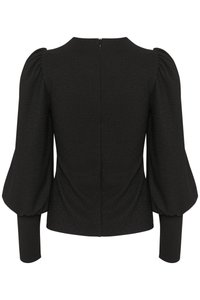 Svart bluse med teksturert stoff, rund halslinje og lange puffarmer. Har glidelås på baksiden for lukking.