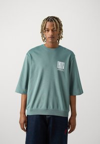 GAP LOGO BACK CREW - Print T-shirt - dark forest