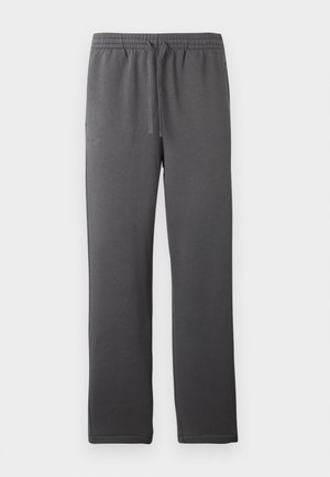 Grijze sportbroek met een elastische tailleband, koord en een gladde textuur. Heeft een rechte pijpontwerp en geen zichtbare zakken.