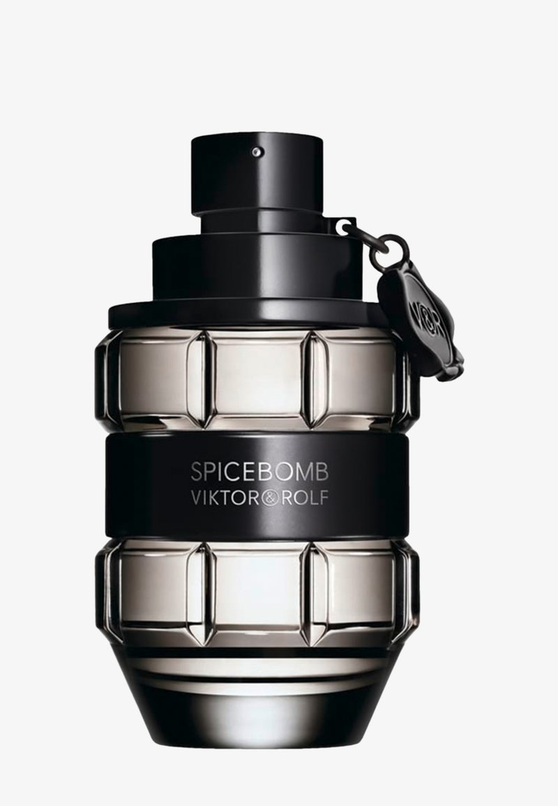Klar glas parfume flaske formet som en granat med sort top og bånd mærket "SPICEBOMB VIKTOR & ROLF" og et sort mærke fastgjort.