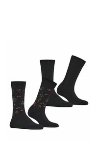 Czarne skarpetki, dwie pary z prążkowanymi mankietami; jedna para ma kolorowe wzory kwiatowe w odcieniach różu, niebieskiego i brązowego na czarnym tle.