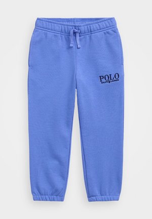 Jasnoniebieskie dresy z elastycznym pasem i ściągaczami przy kostkach, sznurkiem do regulacji, bocznymi kieszeniami oraz czarnym logo "POLO Ralph Lauren" na lewej udzie.