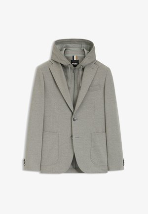Lichtgrijs herenblazer met bijpassend zip-up capuchontrui daaronder, voorzien van twee voorzakken en een enkele knoopsluiting.