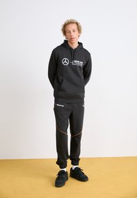 Puma Teplákové kalhoty - puma black