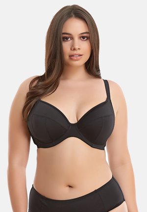 Soutien-gorge noir à armatures avec bonnets moulés, bretelles réglables et finition lisse. Conçu pour offrir un soutien avec une silhouette classique.