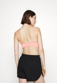 Athleta AURORA TRIANGLE BRA A-C - Sutiã desportivo de suporte ligeiro - sunset glow