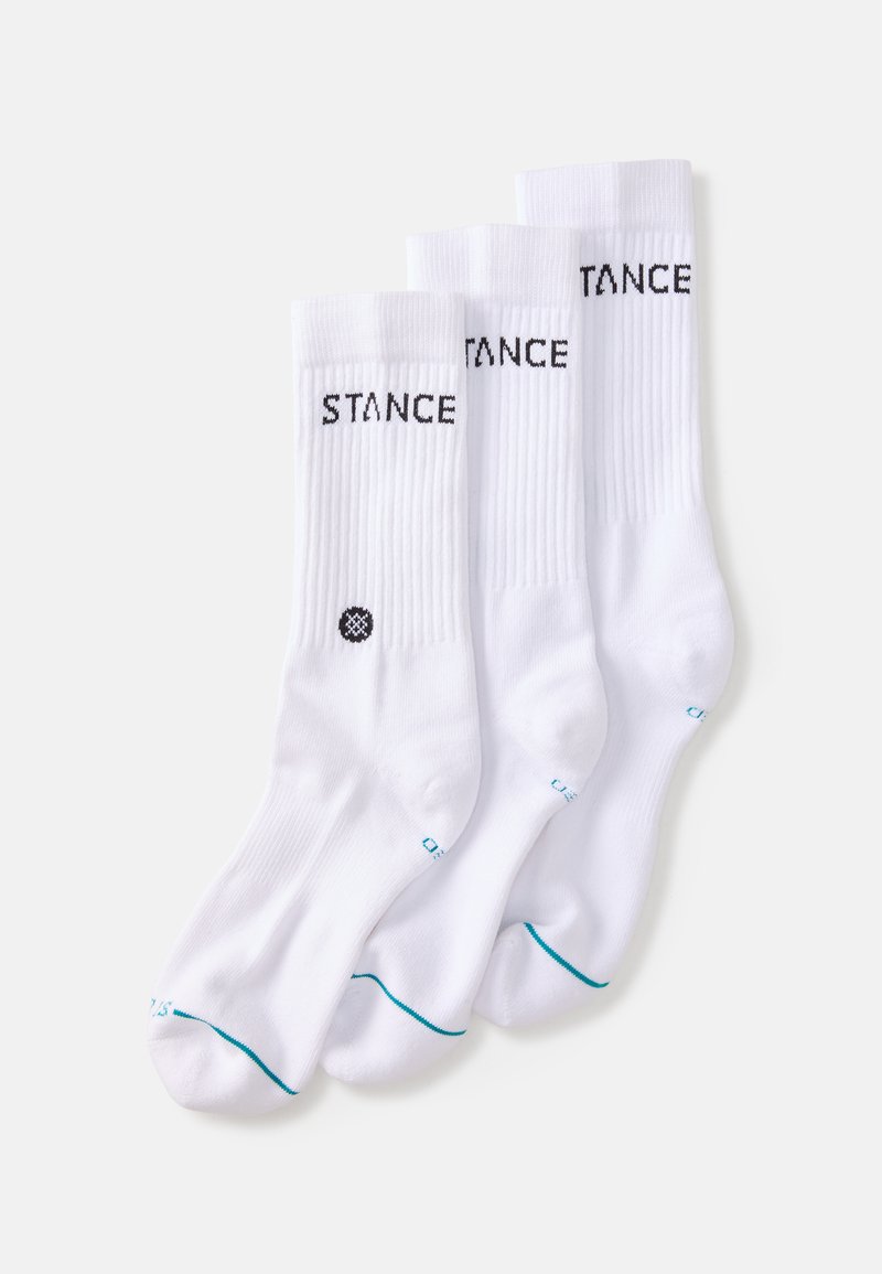 Kolm paari valgeid puuvillaseid crew sokke ribilise tekstuuriga. Cuff'il on must "STANCE" logo ja väike must ringikujuline aksent.