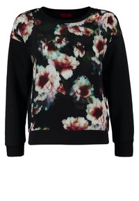 Sweat-shirt noir à manches longues avec un grand motif floral flou blanc, rose et bordeaux sur le devant et les épaules.