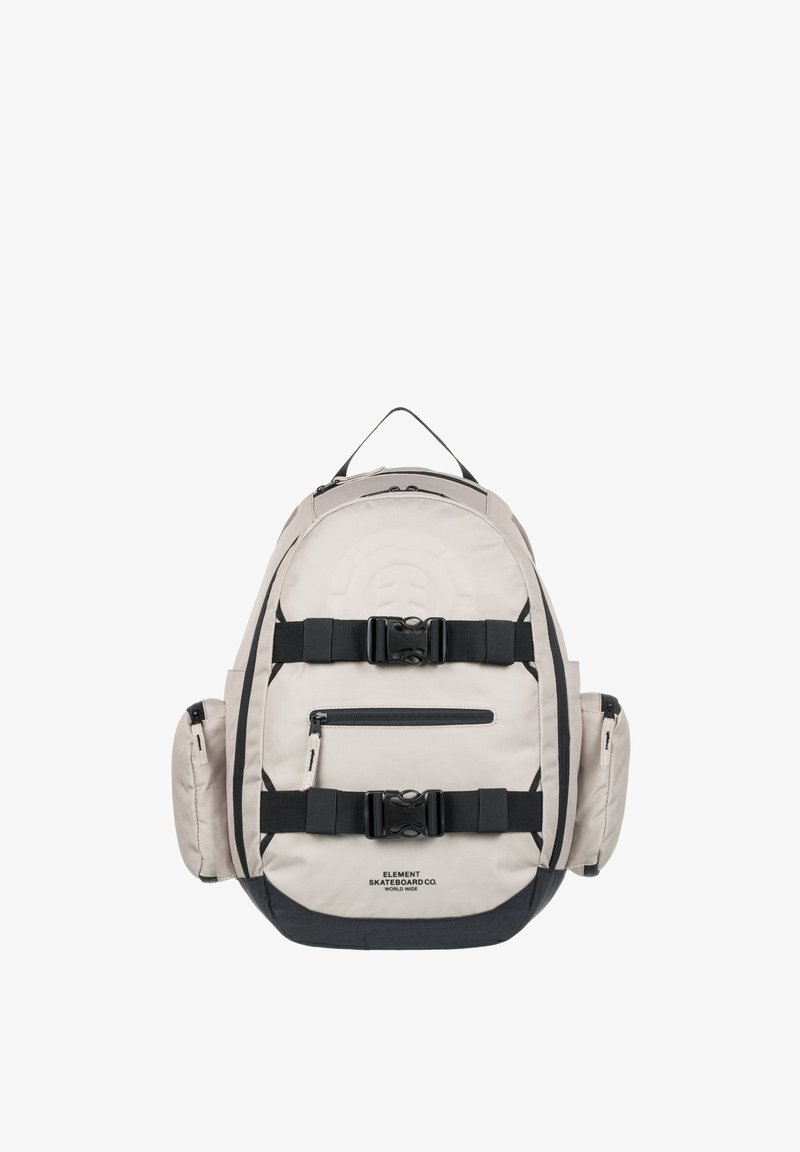 Zaino beige con accenti neri, spallacci regolabili e più tasche. Presenta un motivo testurizzato e una maniglia superiore per un trasporto facile.