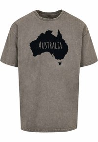 Grijze katoenen t-shirt met een zwarte kaartomtrek van Australië, met daarboven het woord "AUSTRALIË" gedrukt in vette letters.