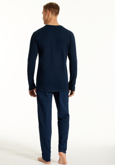Warme donkerblauwe Schiesser herenpyjama | Bestel eenvoudig online Warme donkerblauwe Schiesser herenpyjama | Bestel eenvoudig online