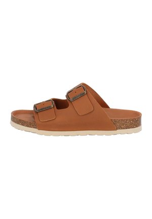 Brown leather slide sandal with two adjustable buckles, a cork midsole, and a white rubber outsole, featuring a smooth texture.