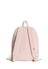 Sac à dos en velours côtelé rose avec des bretelles rembourrées, une poignée supérieure et des poches latérales, présentant une surface texturée et un design simple.