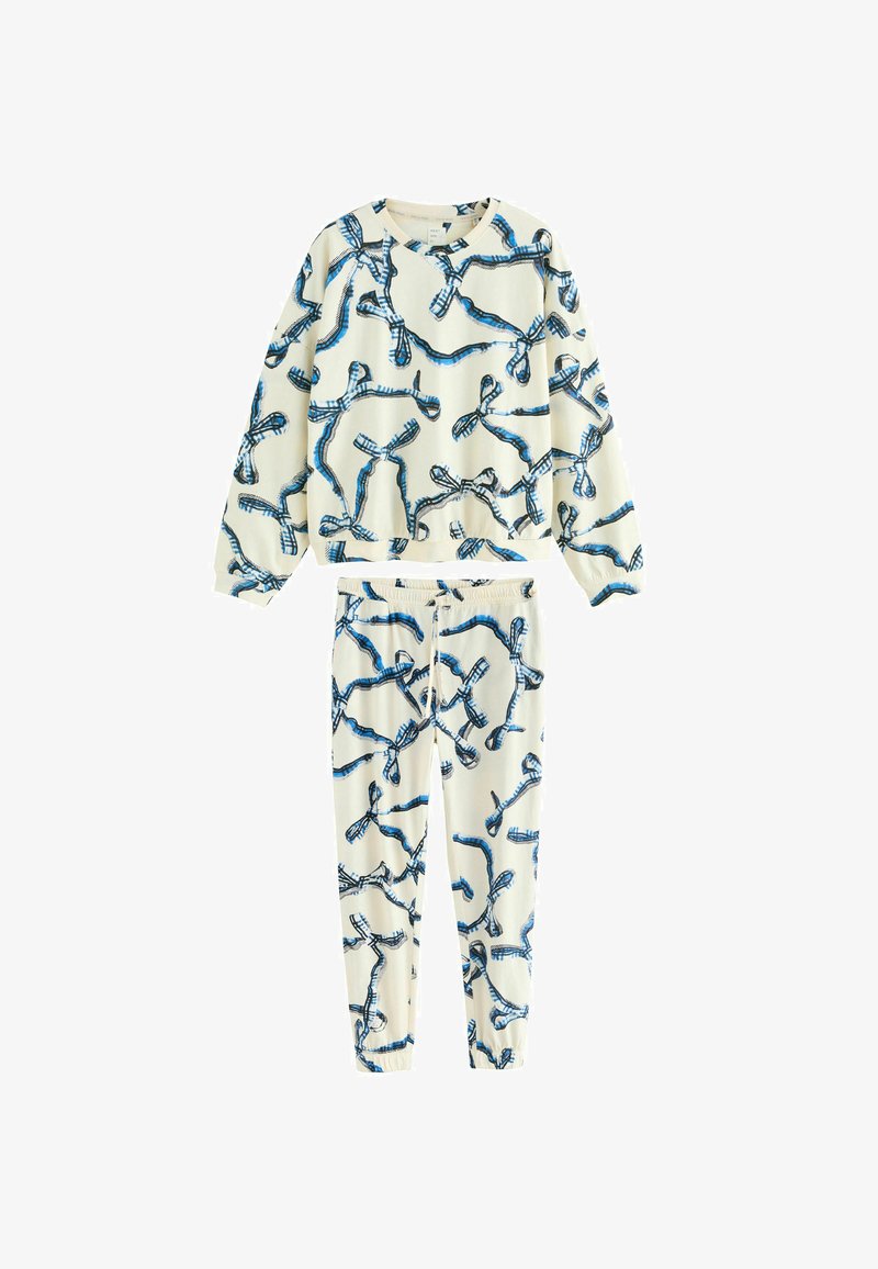 Cotton loungewear set featuring a blue abstract pattern on a cream background, with a loose-fit sweatshirt and tapered pants.