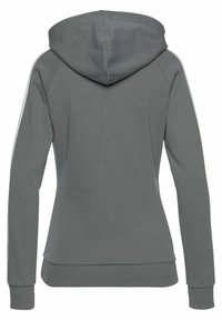 Kapuzensweatshirt aus grauem Stoff mit weißen Seitenstreifen. Das Design umfasst gerippte Bündchen und Saum sowie eine lockere Passform.