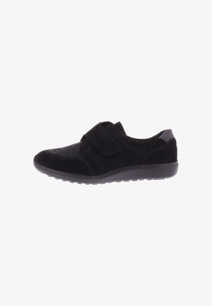 Black shoes with a velcro strap, featuring a combination of matte and textured suede materials, a rounded toe, and a textured rubber sole.