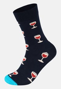 Námornícka ponožka s modrým prstom, s opakovaným vzorom pohárov na víno v červenej a bielej farbe. Vyrobená z mäkkej a elastickej látky.