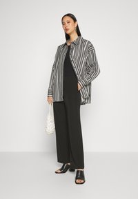 Modström PERRY PANTS - Calças - black