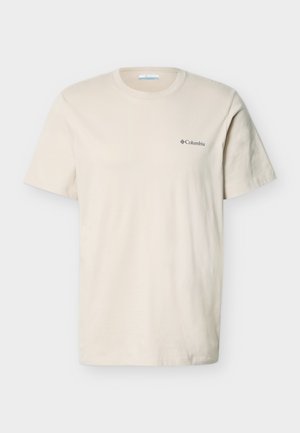 Beige cotton T-shirt with a crew neck, short sleeves, and a small navy Columbia logo on the left chest area. Smooth texture.