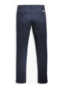Pantalon slim bleu marine avec poches à pattes boutonnées à l'arrière, passants pour ceinture, et une petite étiquette de marque rectangulaire sur la poche droite.