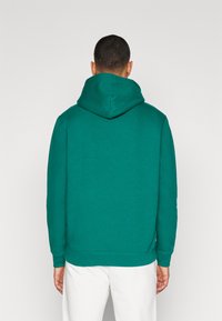 Champion ICONS HOODED SMALL LOGO - Jersey con capucha - dark green