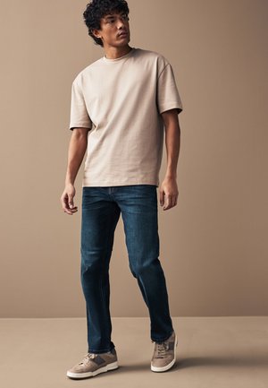 Next MOTION FLEX STRETCH - Sirgete säärtega teksad - blue