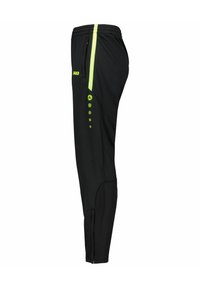 Zwarte sportbroek met een slanke pasvorm, voorzien van limegroene zijstrepen en knoopaccenten langs het buitenbeen voor extra detail.