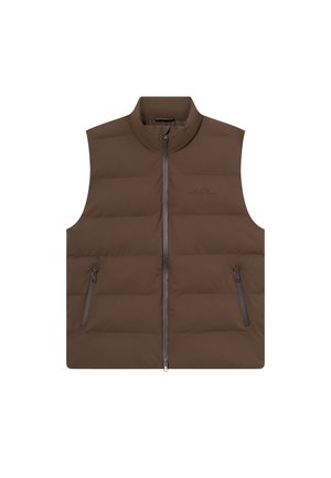 Pruun puffertagi koos seisva kraega, esise close'iga ja kahe tõmblukuga küljetaskuga. Kerge materjal, millel on tikandite tekstuur.