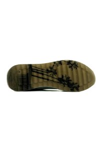 Rubber sneaker sole in beige, featuring deep grooves and a faded palm tree pattern. Flat, textured design with a rounded toe.