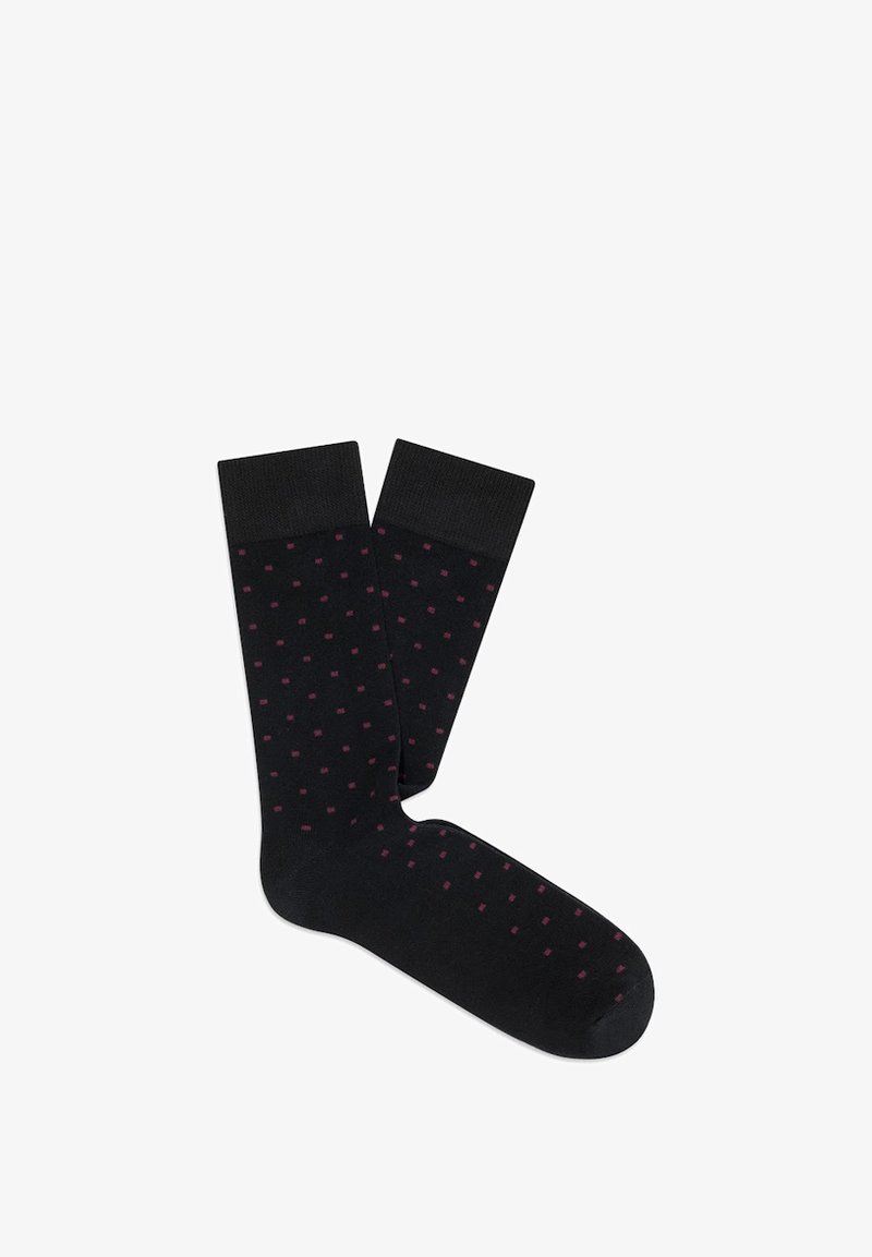 Czarne skarpetki z prążkowanym ściągaczem, ozdobione małymi bordowymi kropkami rozmieszczonymi w nieregularny wzór na całej powierzchni. Miękka tekstura materiału.