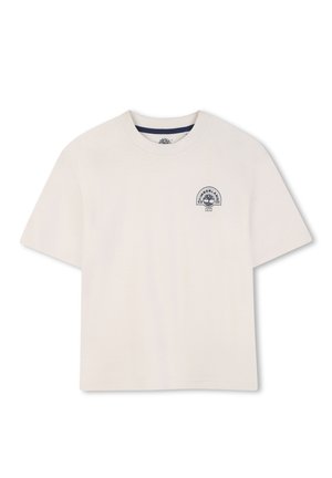 Hellbeiges Baumwoll-T-Shirt mit rundem Halsausschnitt. Mit kleinem marineblauem Grafiklogo auf der linken Brustseite. Kurze Ärmel, lässige Passform.