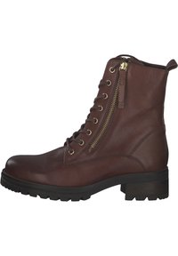 Bottine en cuir marron avec un bout arrondi, un laçage à l'avant et une fermeture éclair sur le côté. Possède une semelle texturée et un petit talon carré.