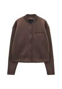 Hnědá mikina ve formě bundy vyrobená z hladkého materiálu, s kulatým límcem, patentkami a malou náprsní kapsou. Volný střih s dlouhými rukávy.