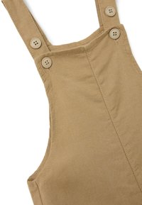 Khaki overall met schouderbanden, voorzien van twee knopen op elke band, gemaakt van een textiel met een gestructureerde stof en een gladde afwerking.