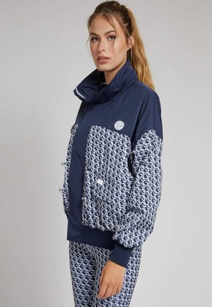 ALLOVER-LOGO - Giacca a vento - blau