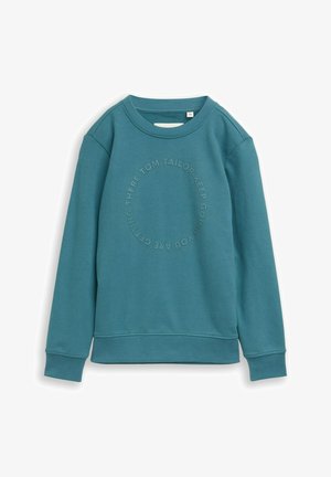 Groene trui gemaakt van zachte stof, met een ronde halslijn en geribde manchetten. Ontworpen met een cirkelvormige tekstprint op de voorkant.