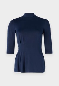 Navy blue top with a high neckline, three-quarter sleeves, and side pleats. Made from a smooth, stretchy fabric with a fitted silhouette.