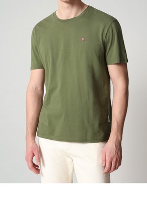 Olive green cotton t-shirt with a round neck and short sleeves, featuring a small embroidered logo on the chest and a rectangular label at the hem.