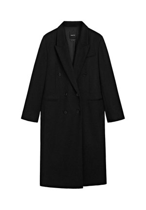 Cappotto doppio petto nero realizzato in un tessuto morbido, con rever a punta, due grandi bottoni frontali e tasche laterali. Taglio lungo e dritto.
